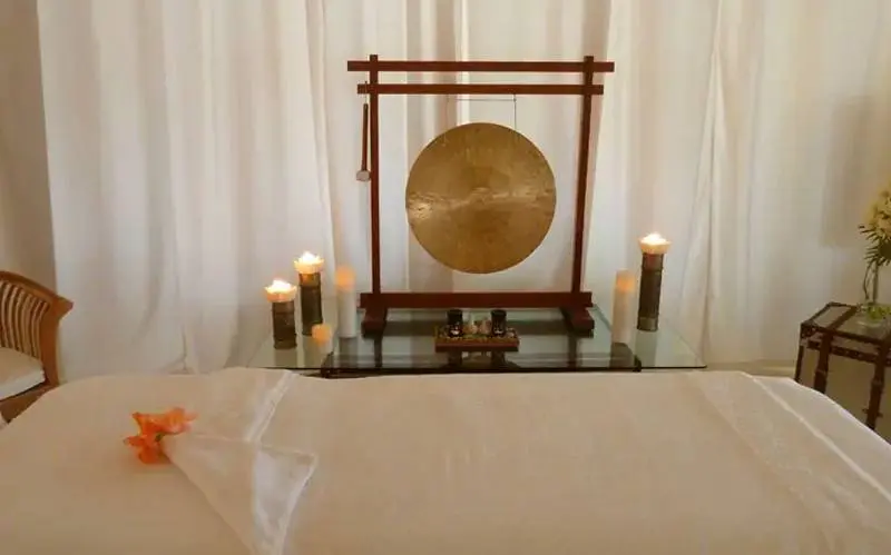 gong beside a bed
